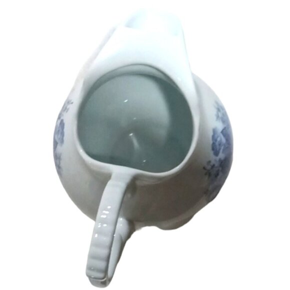 White & Blue Flower Decorated Ceramic Milk Jug by Inspiration, Rigaud, QC - Picture 5 of 7